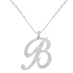 Collana lettera grande in corsivo con zirconi